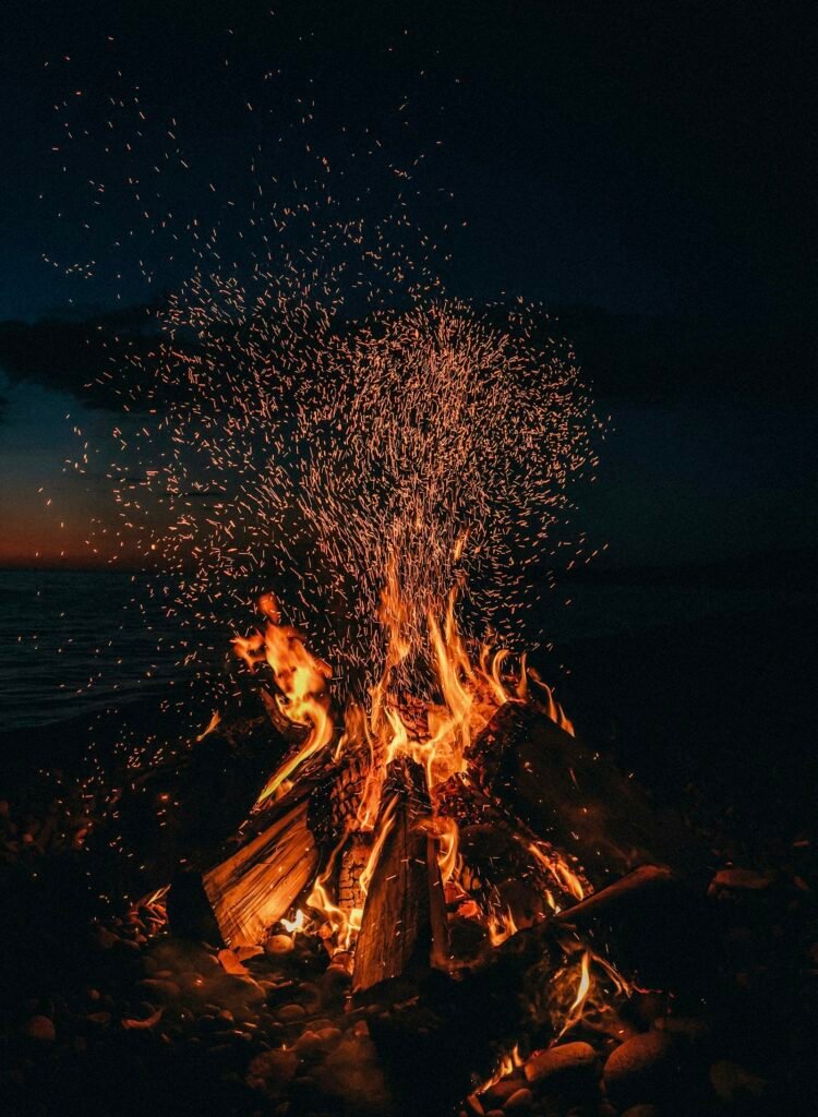 Beach bonfire at night